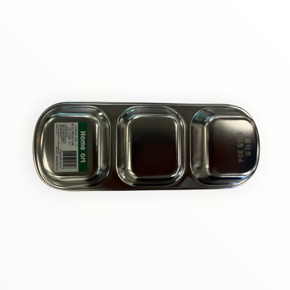 3-compartment sauce dish underside showing Home Art label and SUS 304 stainless steel marking