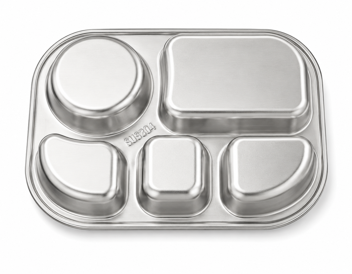 Underside of the stainless divided tray showing the five moulded compartments