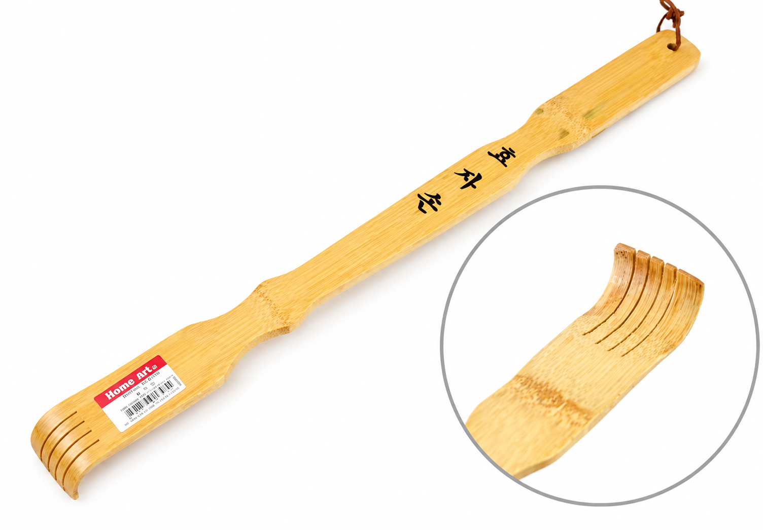 Korean bamboo back scratcher (효자손) with raked head and leather hanging loop